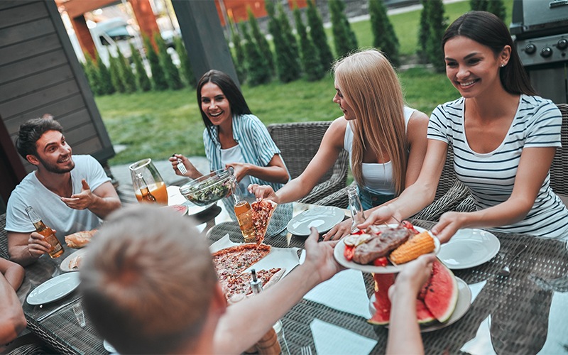 a group of people sitting at a table